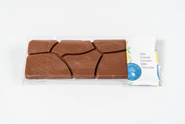 Crucian Coconut Milk Chocolate bar with a visible brand label on a white background