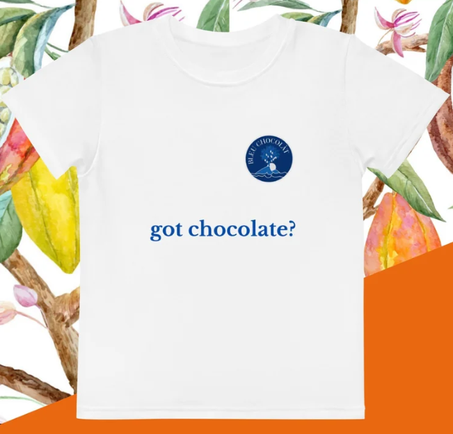 White t-shirt with 'got chocolate?' text and chocolate bean graphic on a floral background